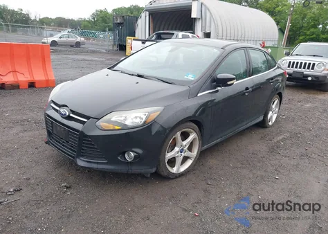 2012 Ford Focus Titanium z USA, uszkodzony, nr VIN 1FAHP3J29CL384353